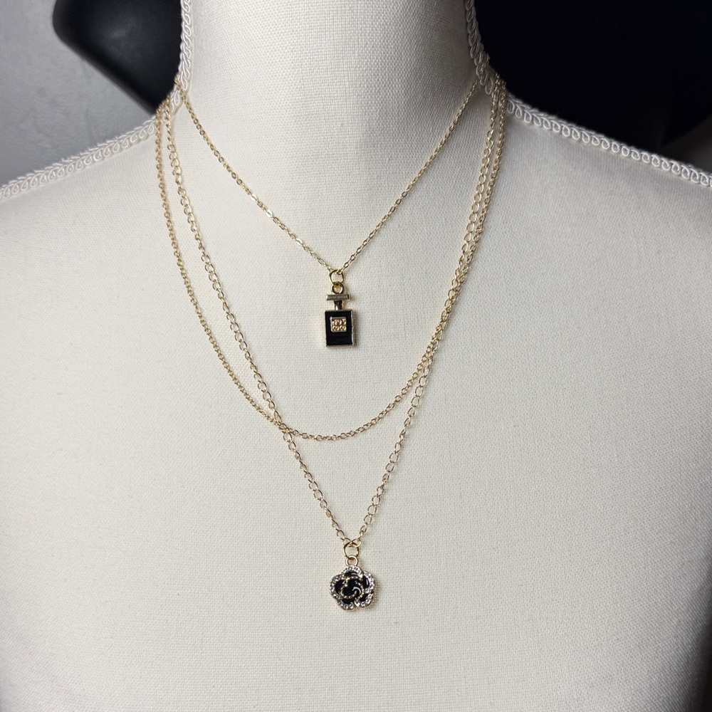Up Crystal Collection gold colored triple layer necklace